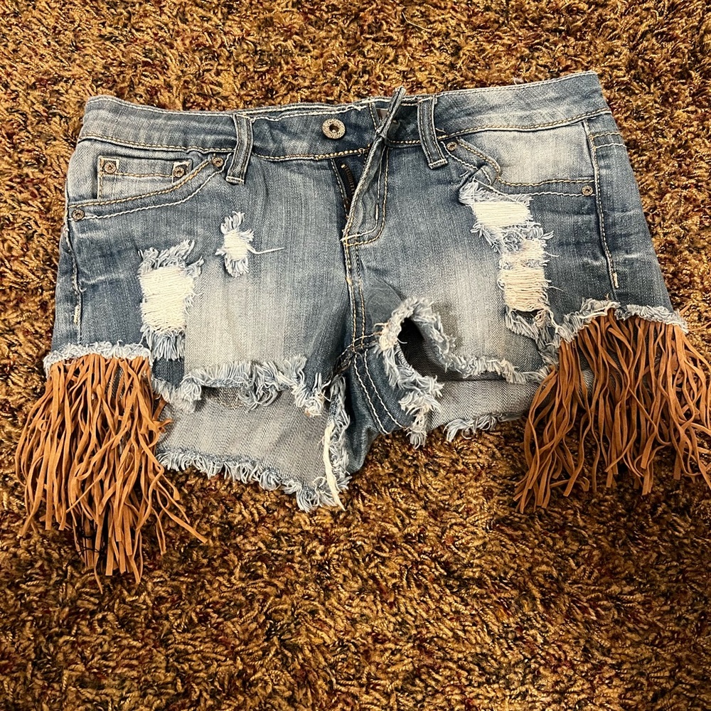 Western denim shorts with fringe